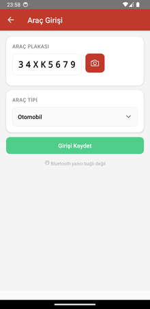 Araç girişi ekranı: plaka alanı, kamera butonu ve araç tipi seçimi
